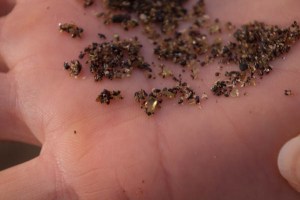 Peridot Crystals in Sand